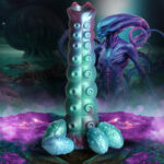 Get bred by this Galactic Breeder! The gorgeous, iridescent, teal-red-blue colors catch the light and make it look mystical.